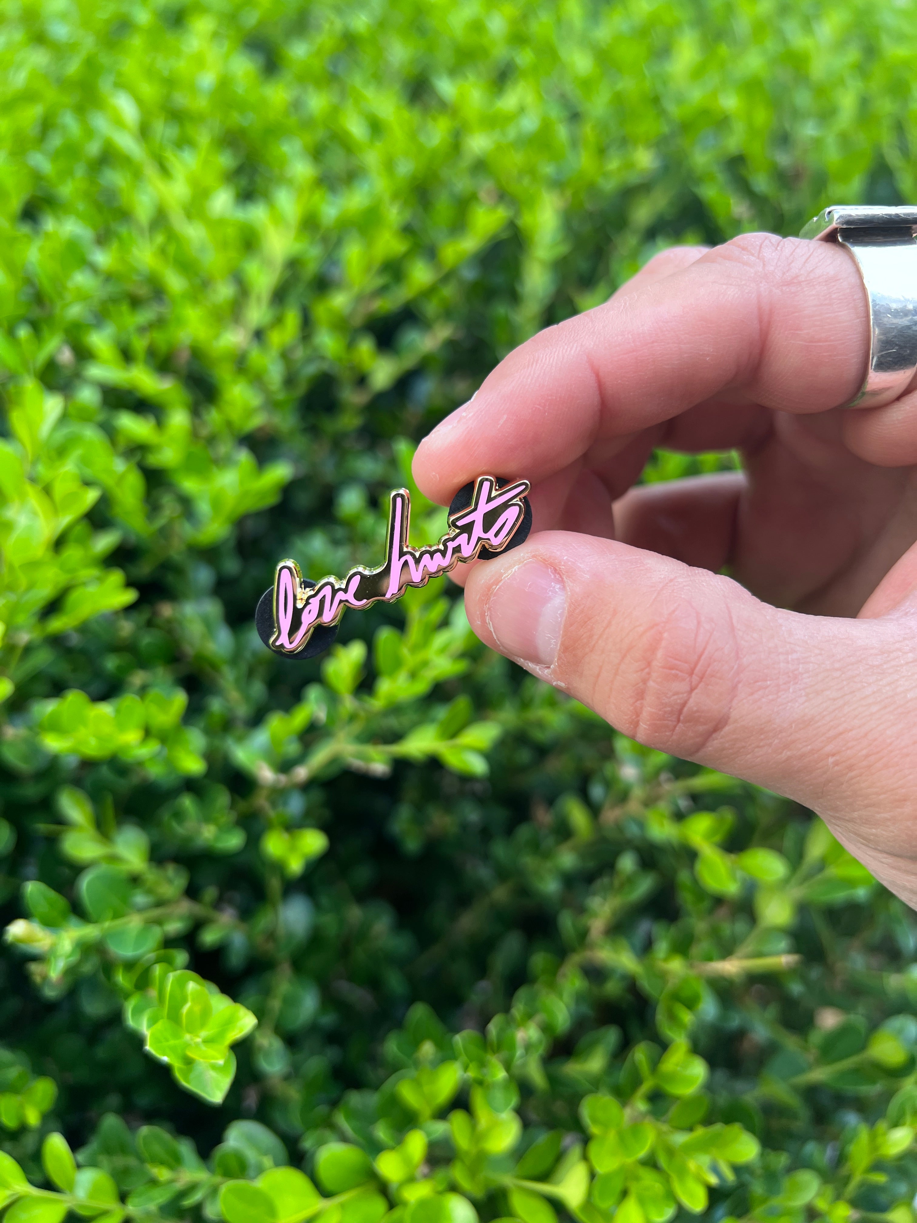 LOVE HURTS GOLD PIN